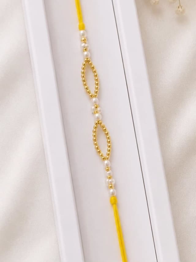 Pearl & Golden Bead Rakhi Pair